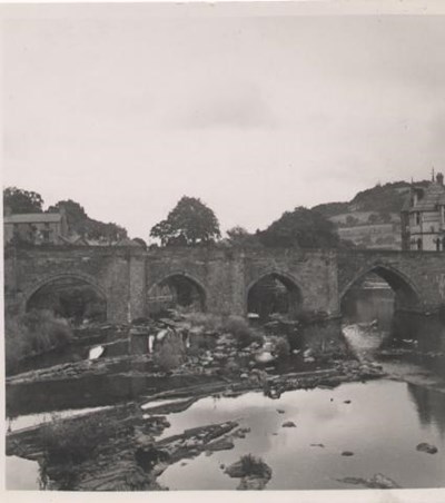 Kathleen Lyon photograph collection - rocky pool with river bridge
