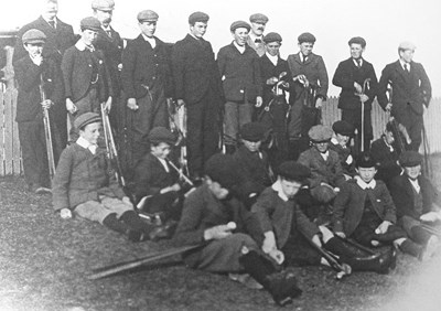 Group of caddies and golfers