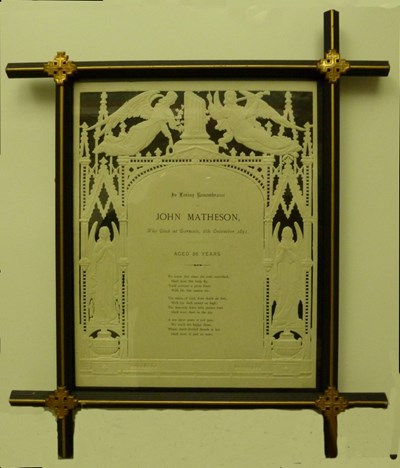 Framed memorial to John Matheson