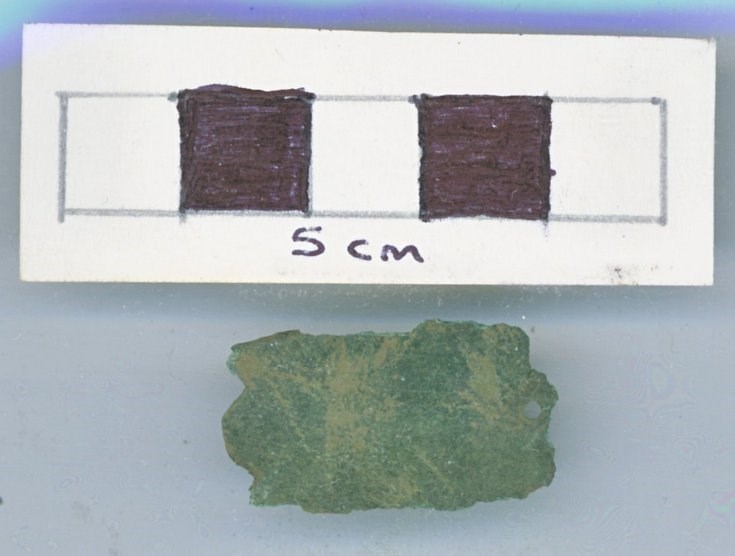 Objects discovered on Pitgrudy Farm - Copper alloy fitting/strap end