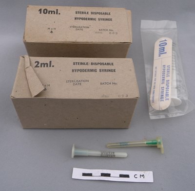 Doctor's medical bag contents: Disposable syringes and needles