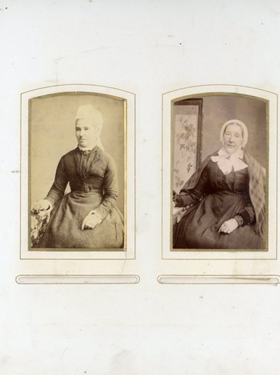 Studio portraits of two ladies with headress