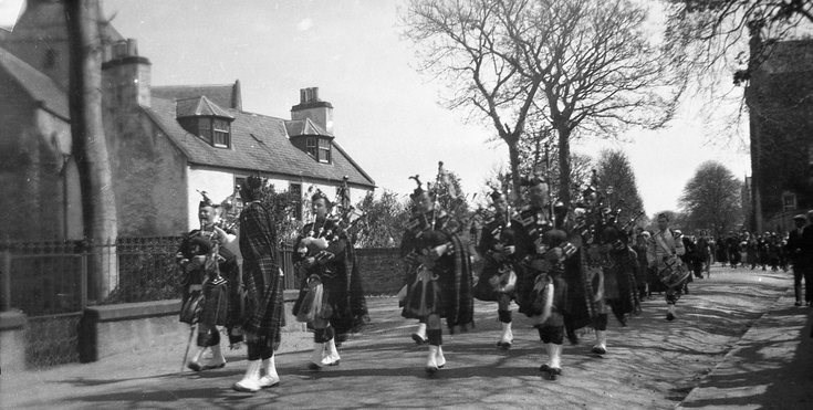 Dornoch Pipe Band marching out of the Square
