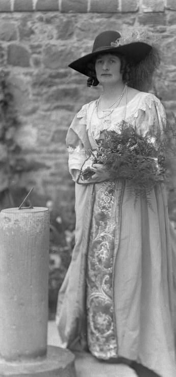 1928 Pageant Costume lady with flowers in Castle 
