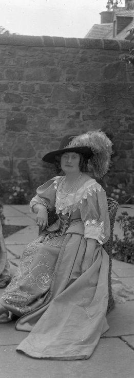 1928 Pageant Costume lady sitting in Castle garden