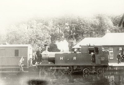 Engine standing in flood water at Dornoch Station
