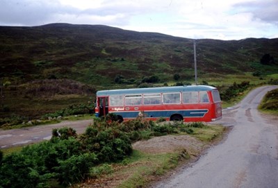 Single deck bus negotiating a bend on the Birichen route