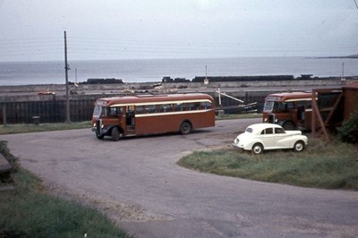 Highland buses in red & white livery at Helmsdale