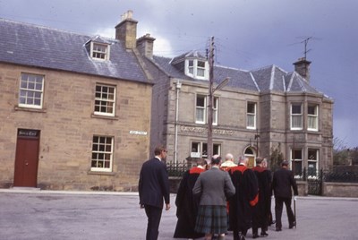 Members of the town council in procession