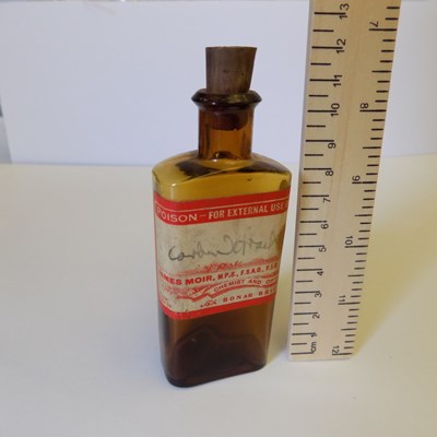 Brown medicine bottle with cork stopper