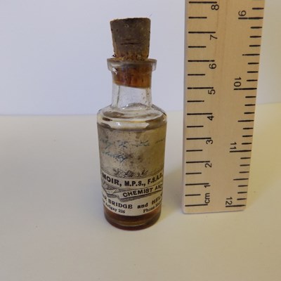 Clear glas medicine bottle with cork stopper