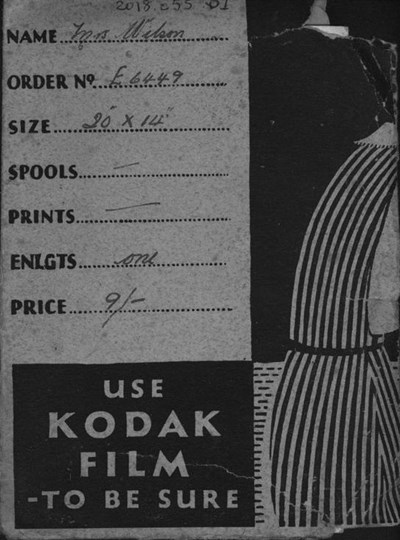 Kodak photograph wallet with 2 photographs