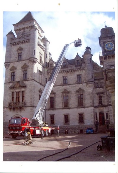 Fire Brigade training at Dunrobin - extension ladder to roof