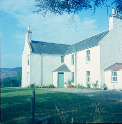 First of two photographs of an unknown house