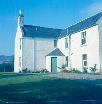 Second of two photographs of an unknown house