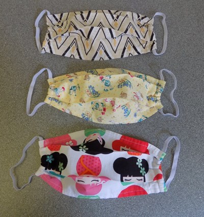 Three patterned face masks