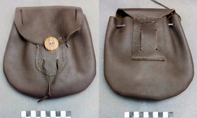 A leather pouch and belt