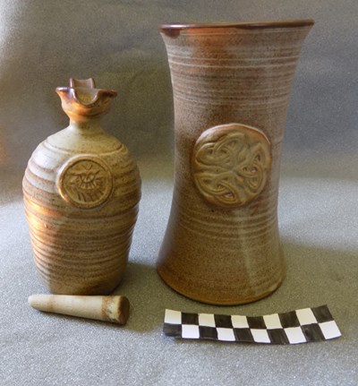 A tankard and oil jug from Dornoch Pottery
