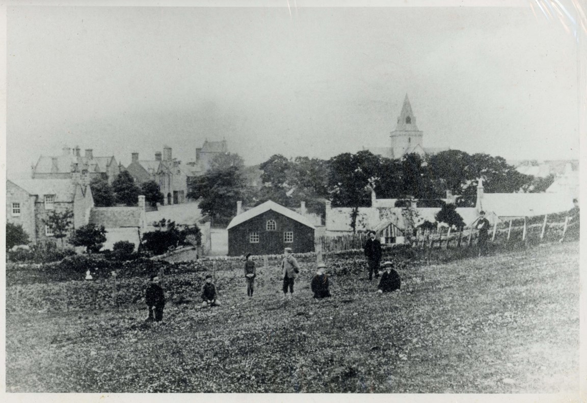 View of Dornoch looking west with children in foreground