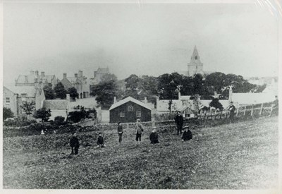 View of Dornoch looking west with children in foreground