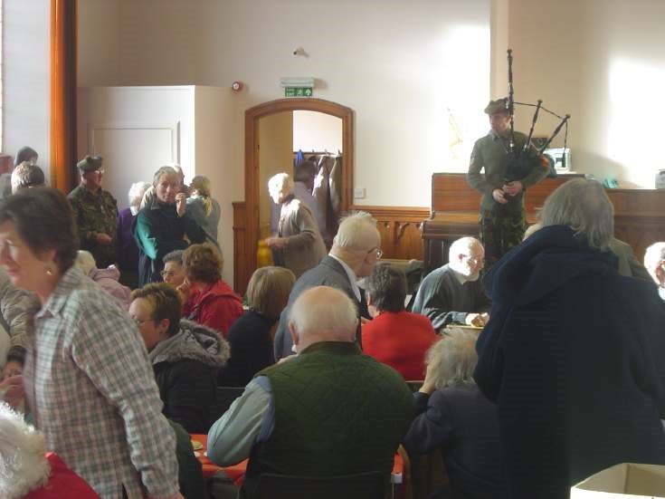 Piper at Dornoch Heritage Society Coffee Morning 2006