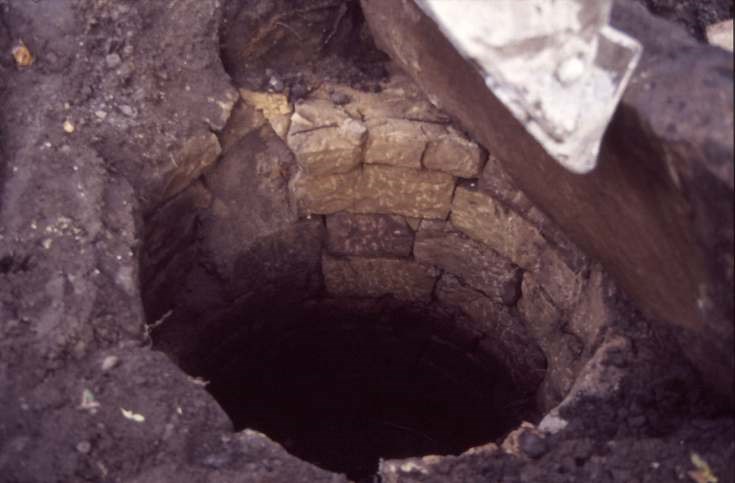 Uncovering well at old manse 1987