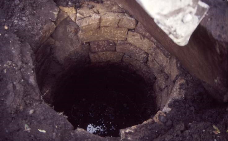 Uncovering well at old manse 1987