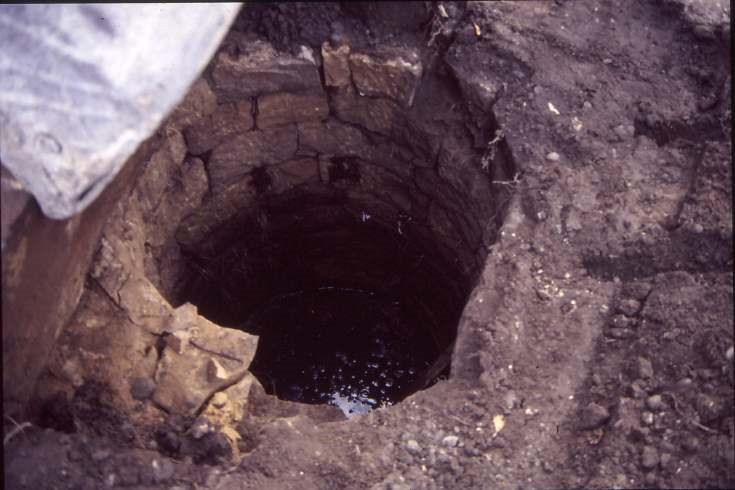 Uncovering well at old manse 1987