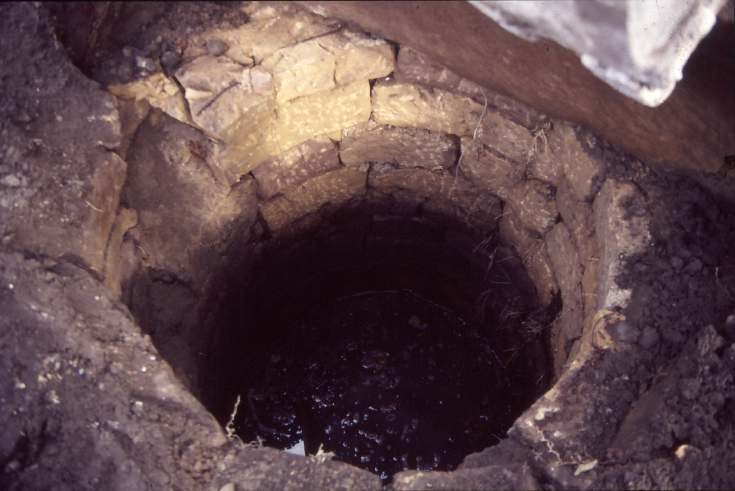 Uncovering well at old manse 1987