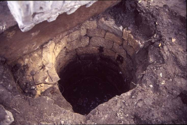 Uncovering well at old manse 1987