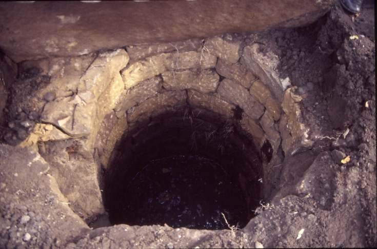 Uncovering well at old manse 1987