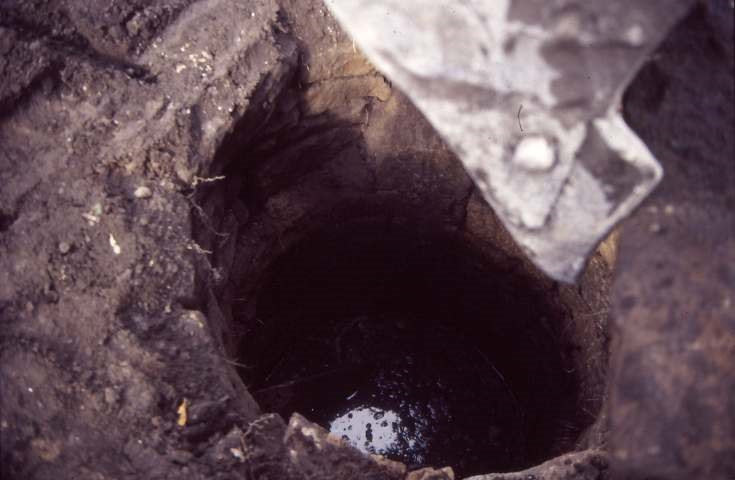 Uncovering well at old manse 1987