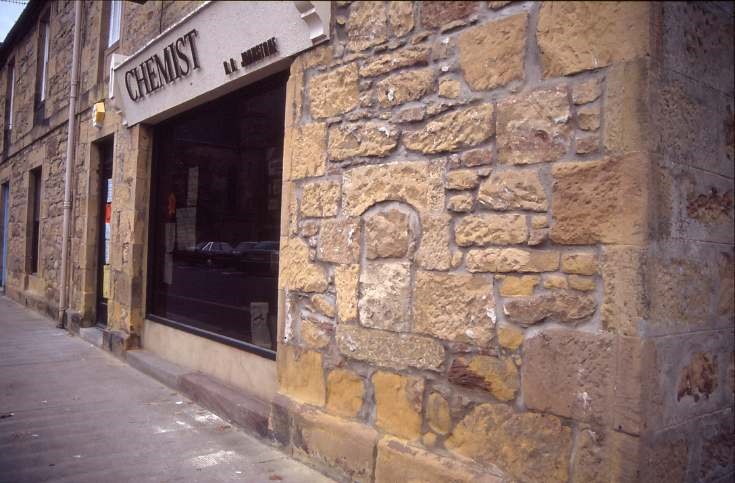 Dornoch High Street showing old post box