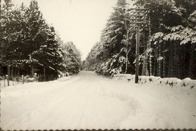Clashmore ~ snow scene of main road, looking east