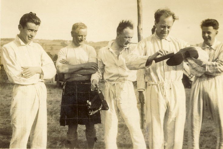 Scout leaders in preparing for camp activity