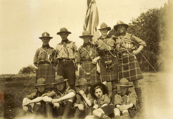 Scouts grouped at flag pole 