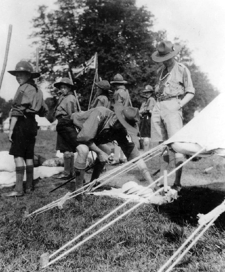 Scout leaders conducting morning inspection
