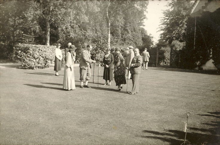 Group playing Croquet