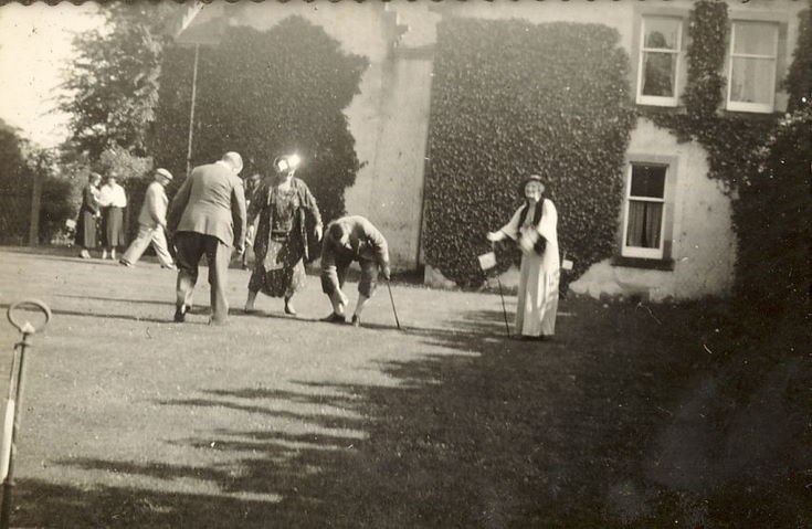 Group playing Croquet