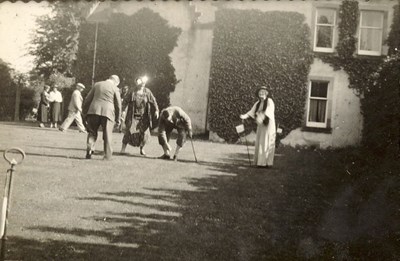 Group playing Croquet