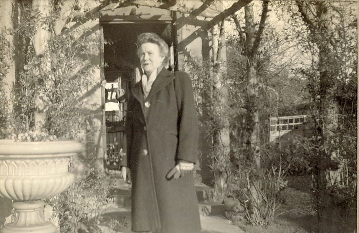 Woman standing in the garden, at Clashmore