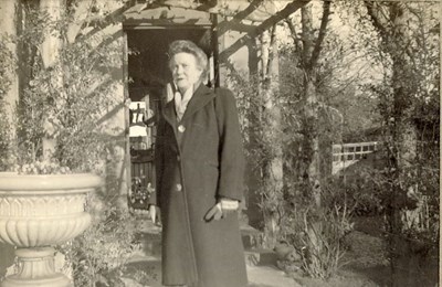 Woman standing in the garden, at Clashmore