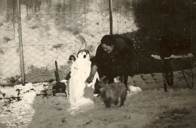 Mrs. Ruby Hardie, building a snowman