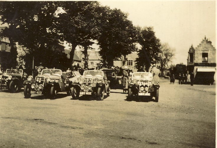 Four Sports Cars in Dornoch Square