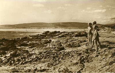 Children on Dornoch beach rocks