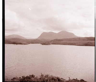 Loch with mountains in the background