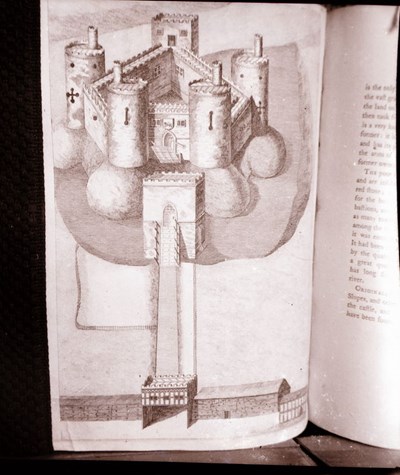Photograph of castle drawing in a book 