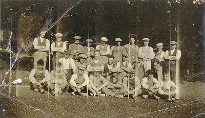 Group photograph of 24 (sawmill?) workers