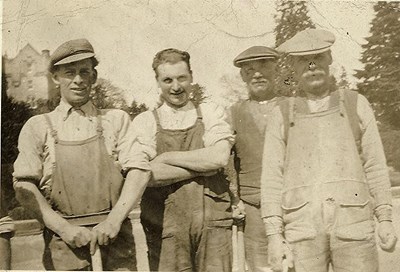 Photograph of four workmen