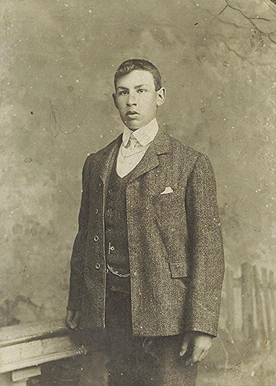 A formal photograph of Donald Mackay